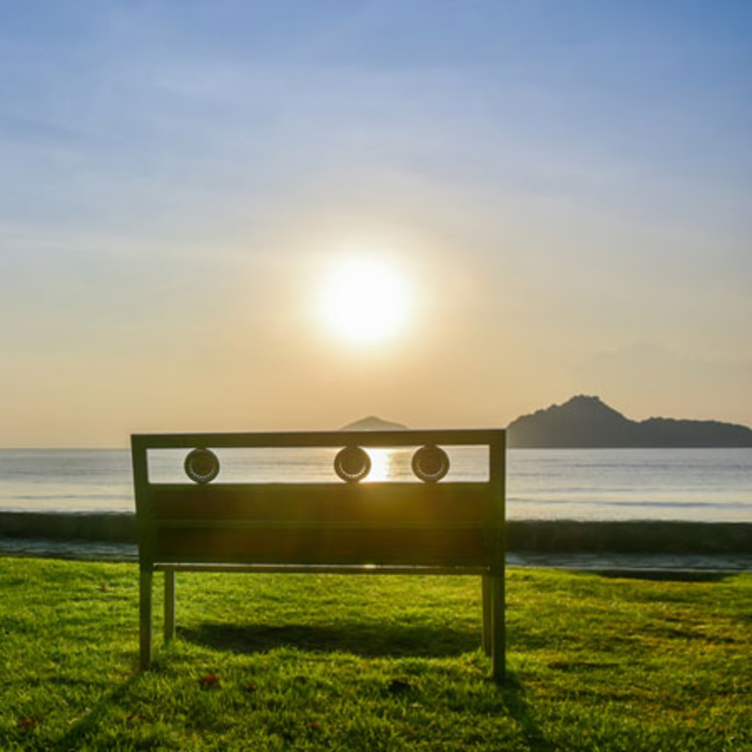 A bench facing the sea — Lyndale Lodge